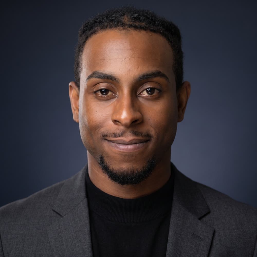 Jordan Ward — studio headshot, smiling